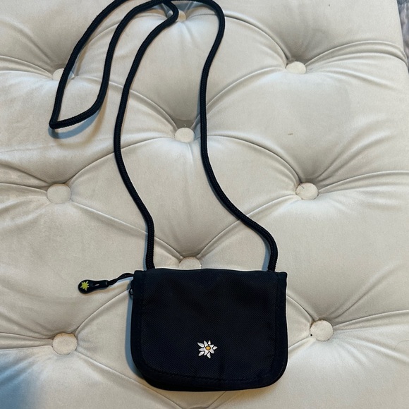 Sherpani Handbags - Sherpani Black Crossbody Bag with Floral Accent